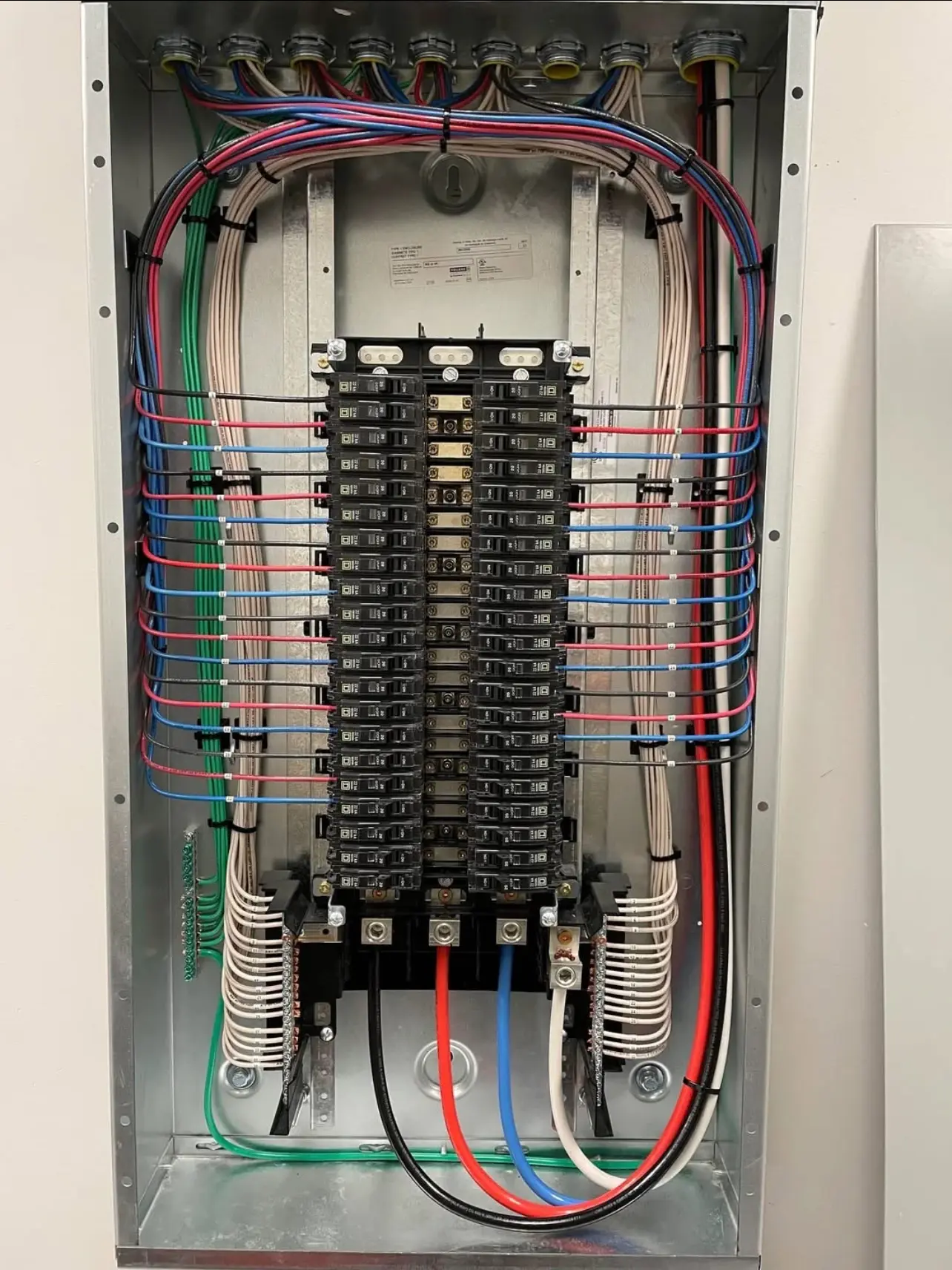 Precision Commercial Panel Cable Routing — Color-coded branch wiring and clean conductor dressing