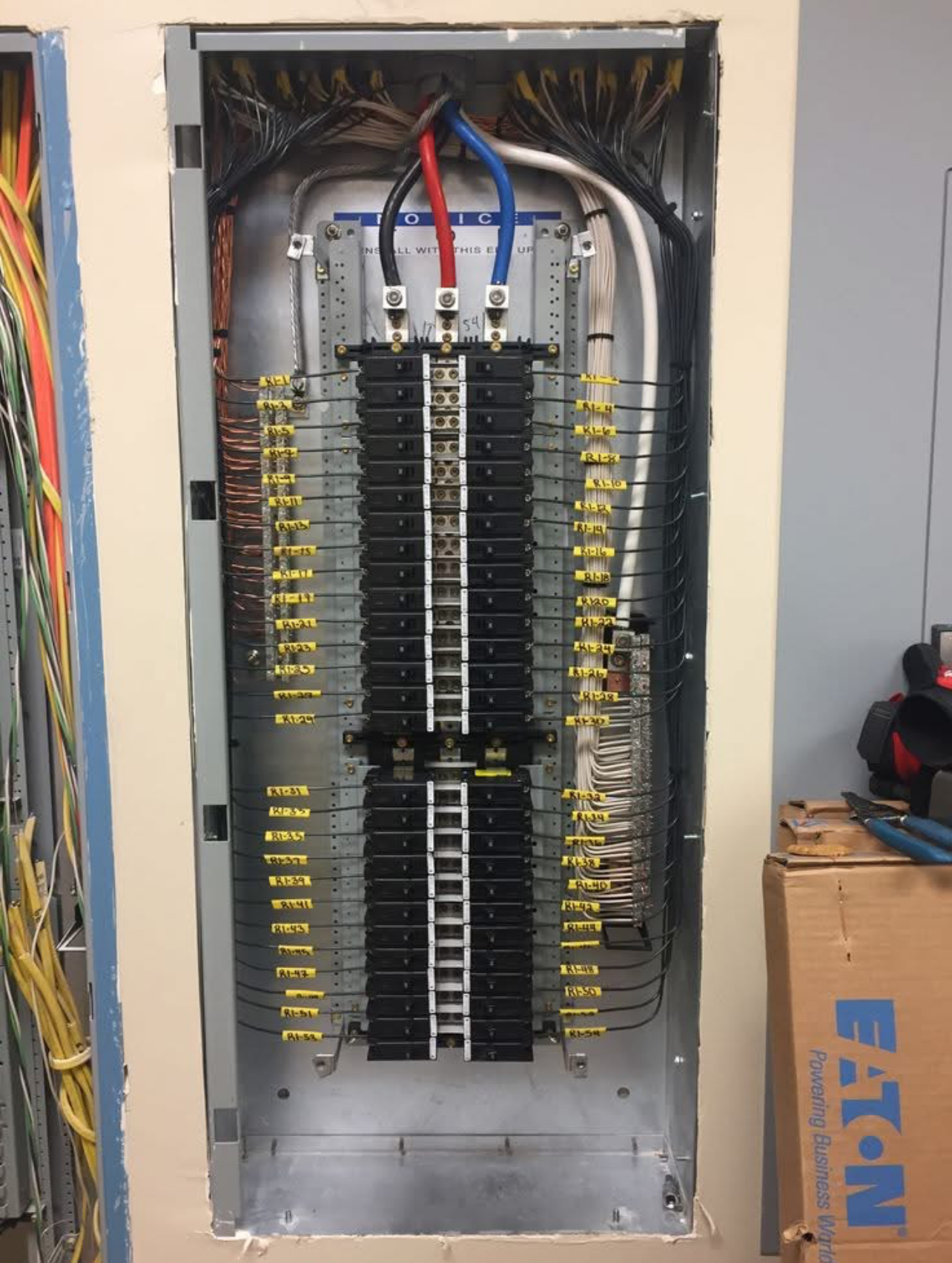 Eaton Distribution Panel Dressing — Numbered branch circuits and terminal routing
